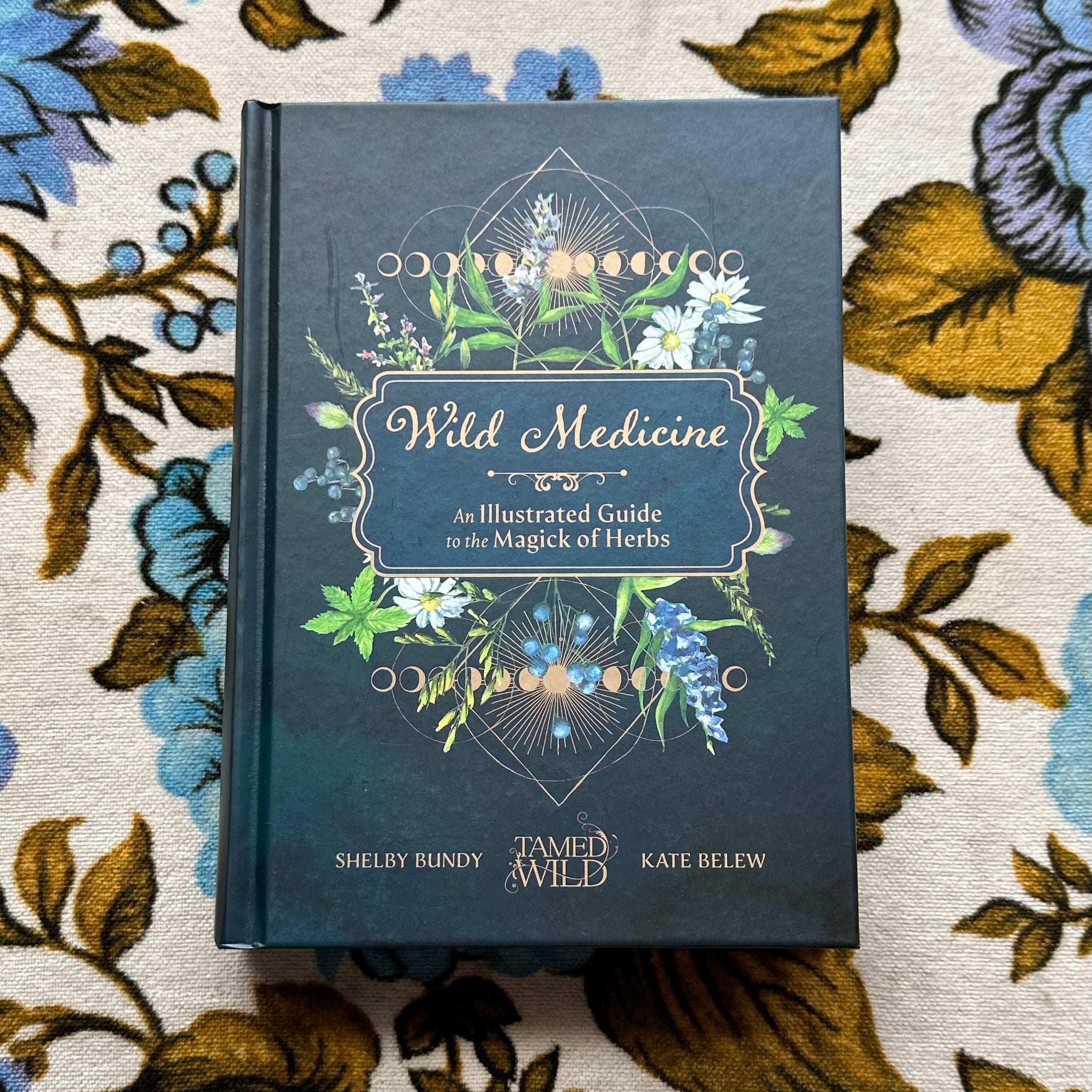 wild medicine: an illustrated guide to the magick of herbs book from flower + furbish Shop now at flower + furbish