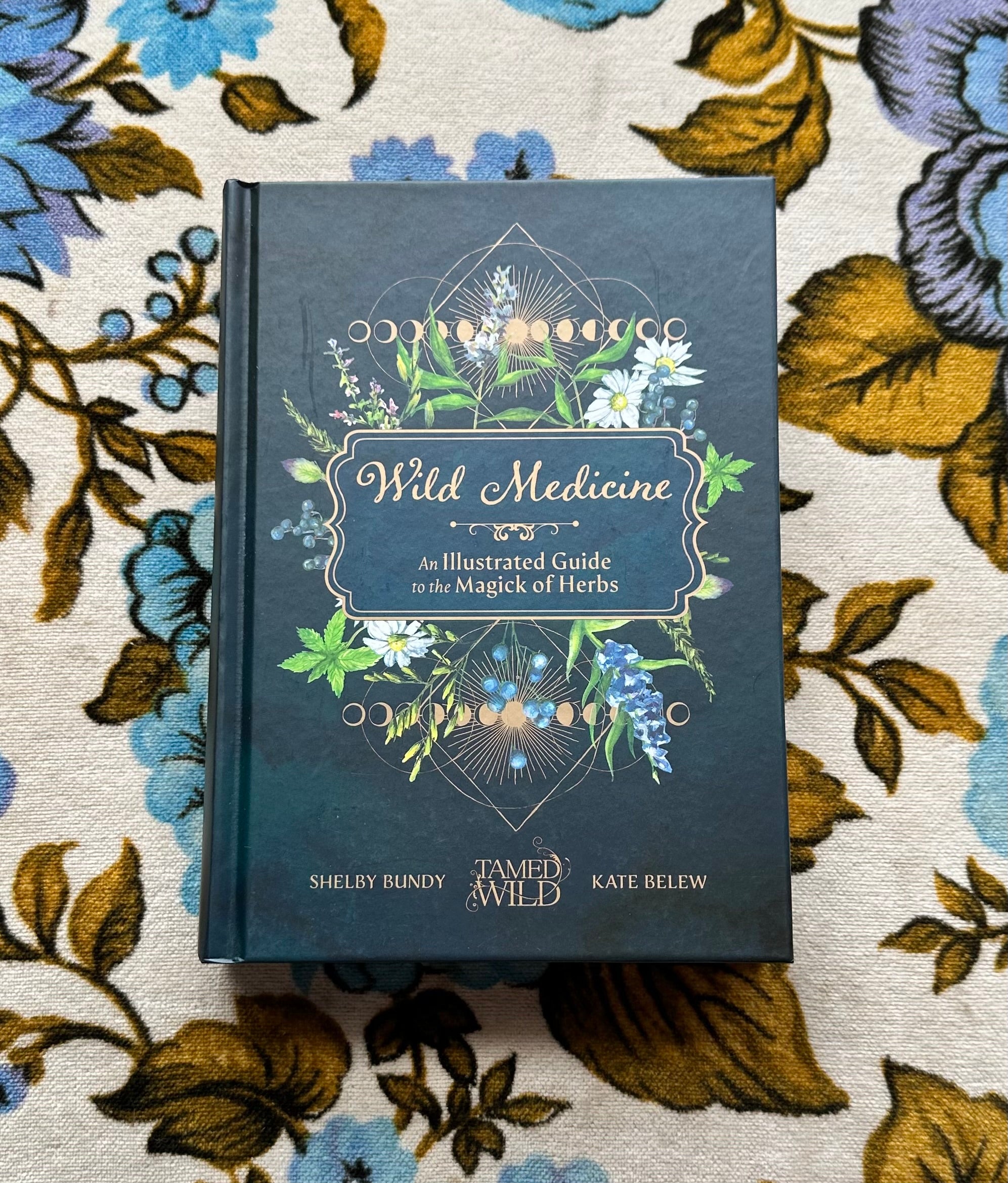 wild medicine: an illustrated guide to the magick of herbs book from flower + furbish Shop now at flower + furbish